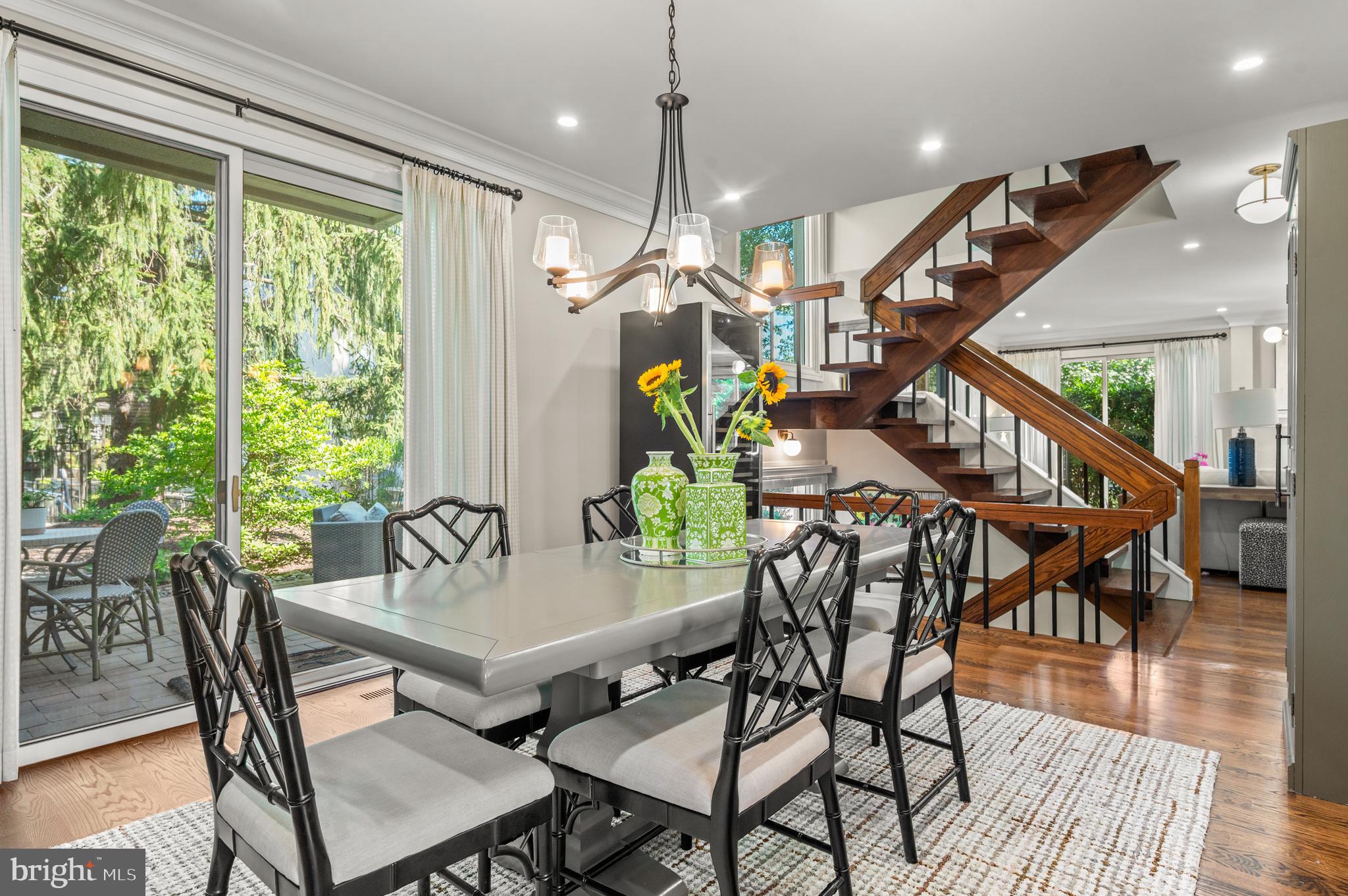 8 Brettagne Devon, PA 19333 - Photo 11 of 38 a dining room with furniture garden view and wooden floor