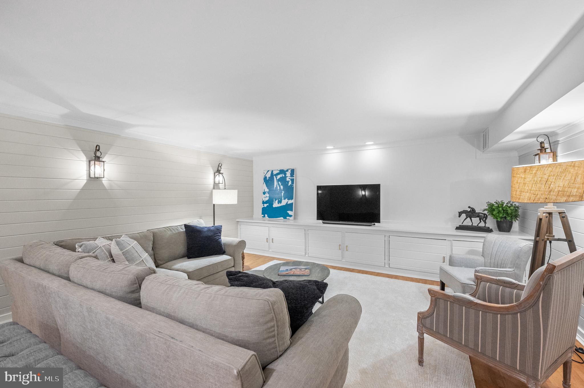 8 Brettagne Devon, PA 19333 - Photo 30 of 38 a living room with furniture and a flat screen tv