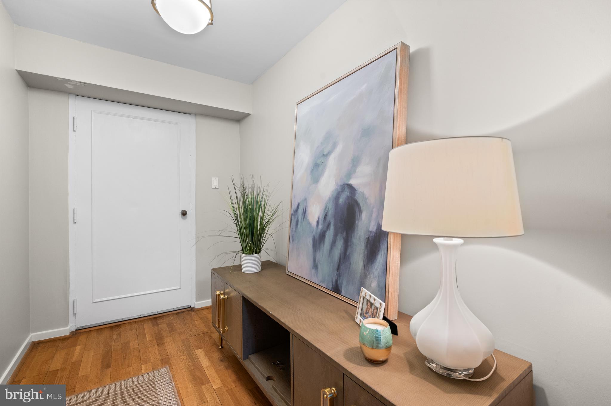 8 Brettagne Devon, PA 19333 - Photo 31 of 38 a room with a table and a potted plant