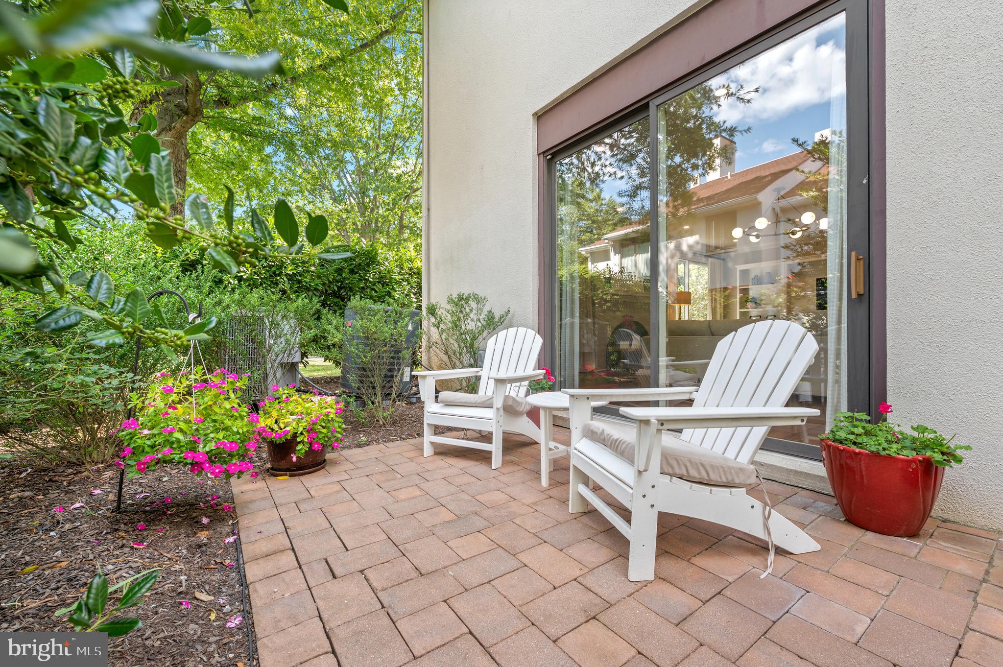 8 Brettagne Devon, PA 19333 - Photo 35 of 38 a building outdoor space with patio furniture and potted plants