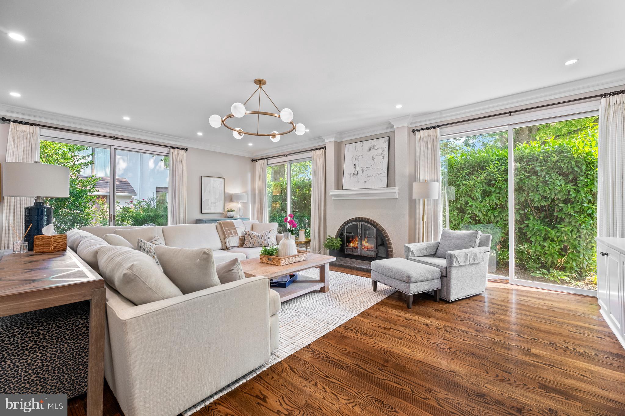 8 Brettagne Devon, PA 19333 - Photo 5 of 38 a living room with furniture fireplace and a large window