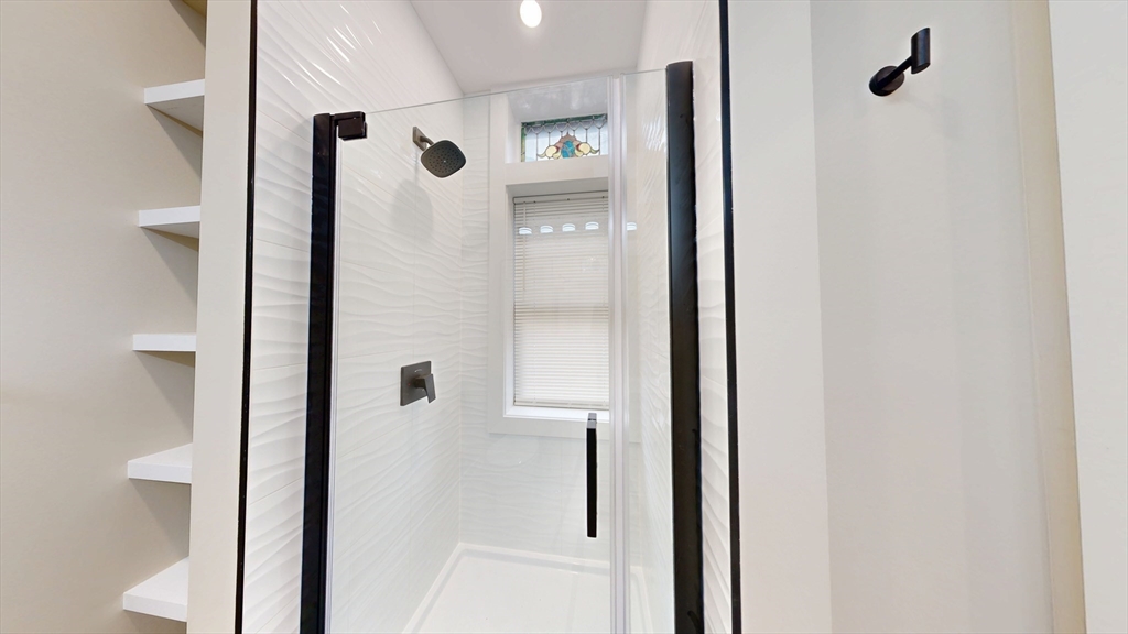 41 Edgerly Road, Unit 1 Boston, MA 02115 - Photo 6 of 12 a bathroom with a shower