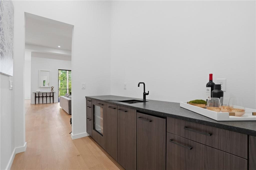 3293 Lenox Place Northeast Atlanta, GA 30324 - Photo 13 of 40 a kitchen with a sink and cabinets