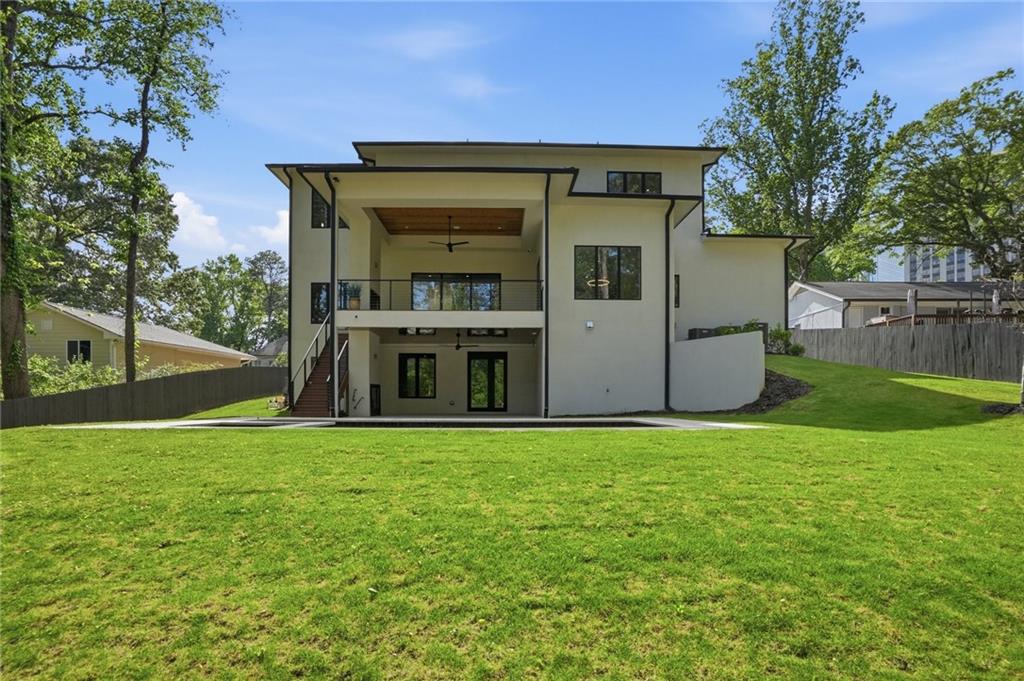 3293 Lenox Place Northeast Atlanta, GA 30324 - Photo 2 of 40 a view of a house with a yard