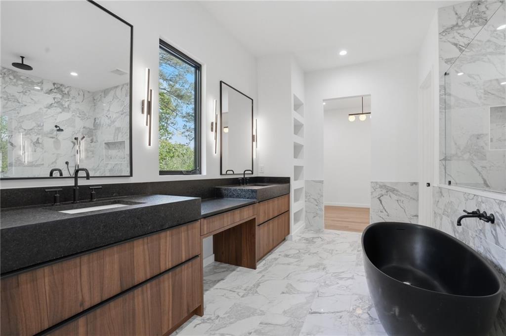 3293 Lenox Place Northeast Atlanta, GA 30324 - Photo 21 of 40 a large kitchen with a sink and a large mirror