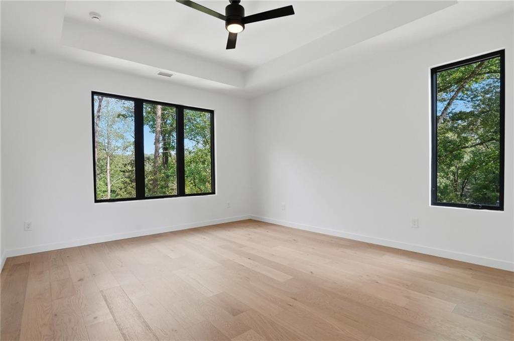 3293 Lenox Place Northeast Atlanta, GA 30324 - Photo 23 of 40 an empty room with windows