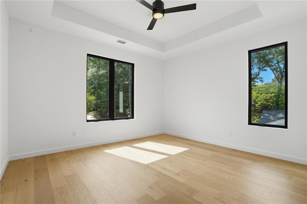 3293 Lenox Place Northeast Atlanta, GA 30324 - Photo 25 of 40 a view of a livingroom with a window and hardwood floor