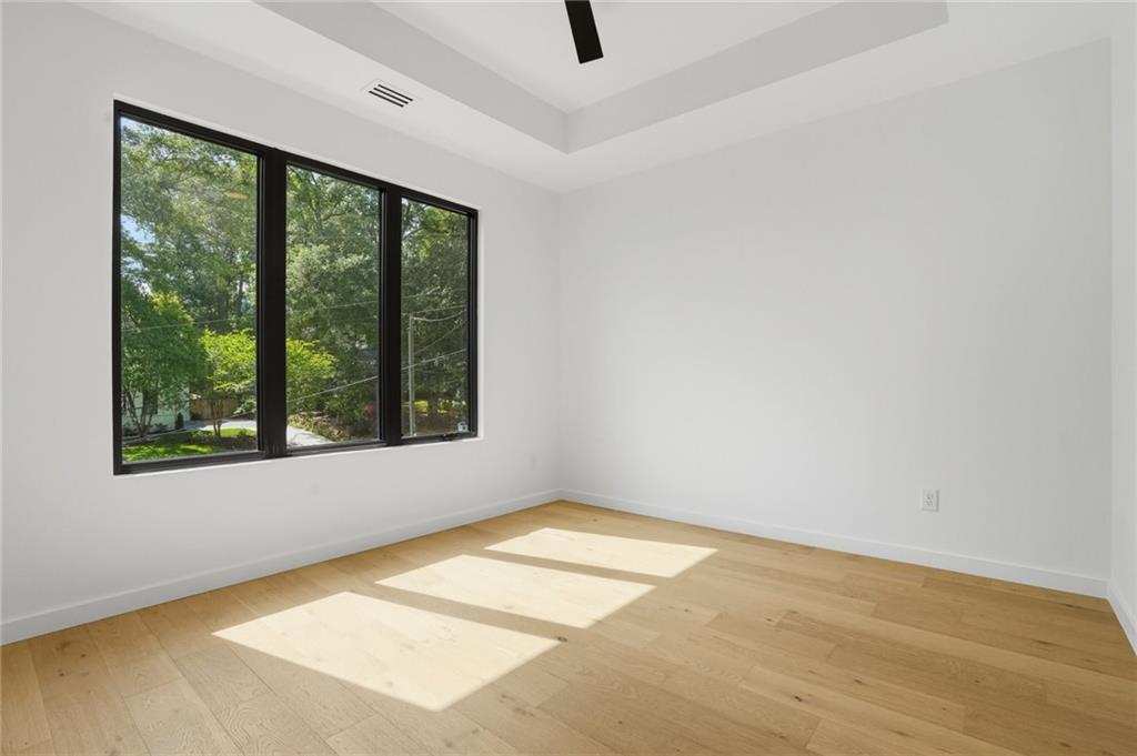 3293 Lenox Place Northeast Atlanta, GA 30324 - Photo 29 of 40 an empty room with a window
