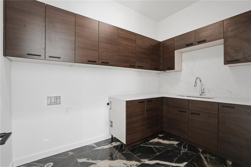 3293 Lenox Place Northeast Atlanta, GA 30324 - Photo 31 of 40 a room with storage and utility