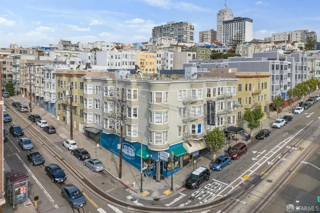 a tall building with a city view