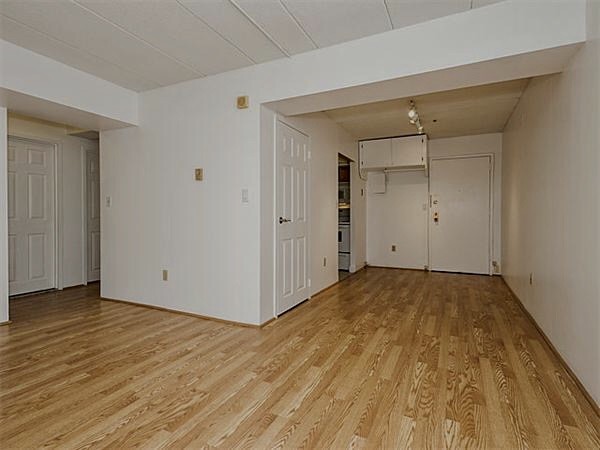 125 Pleasant Street, Unit 309 Brookline, MA 02446 - Photo 4 of 9 a view of an empty room
