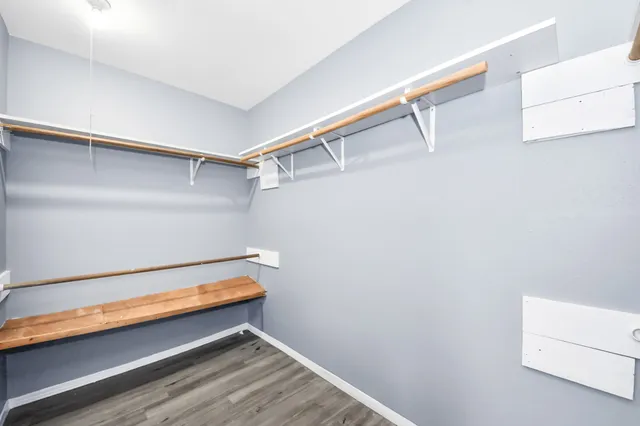 a view of room with racks on the wall