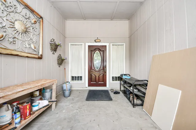 a view of livingroom with washer and dryer