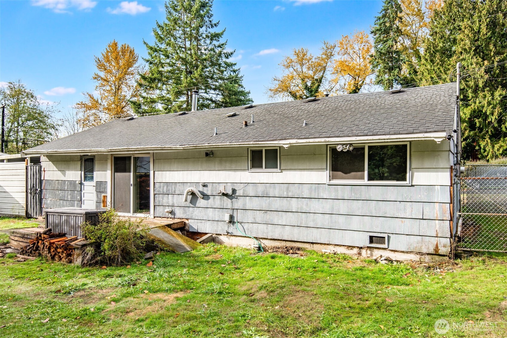 33526 18th Avenue South Federal Way, WA 98003 - Photo 21 of 31 a view of a house with a backyard