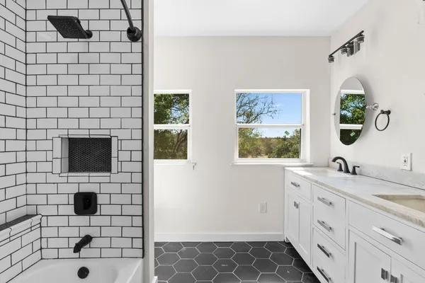 a view of a porch with wooden floor