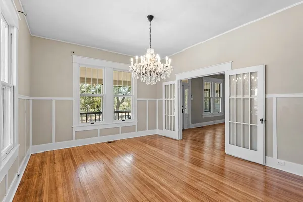 a view of a livingroom with wooden floor