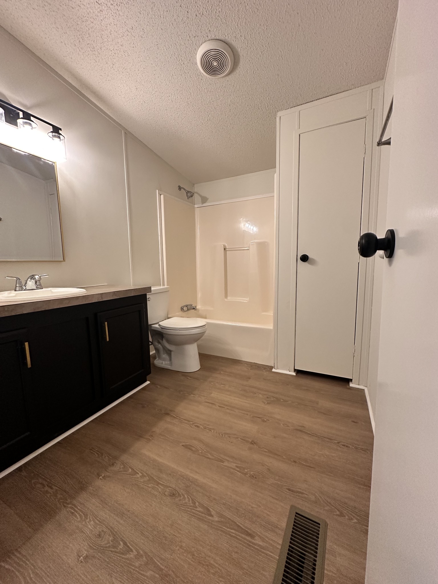 7287 Pinewood Road Nunnelly, TN 37137 - Photo 14 of 18 a bathroom with a sink a toilet and shower