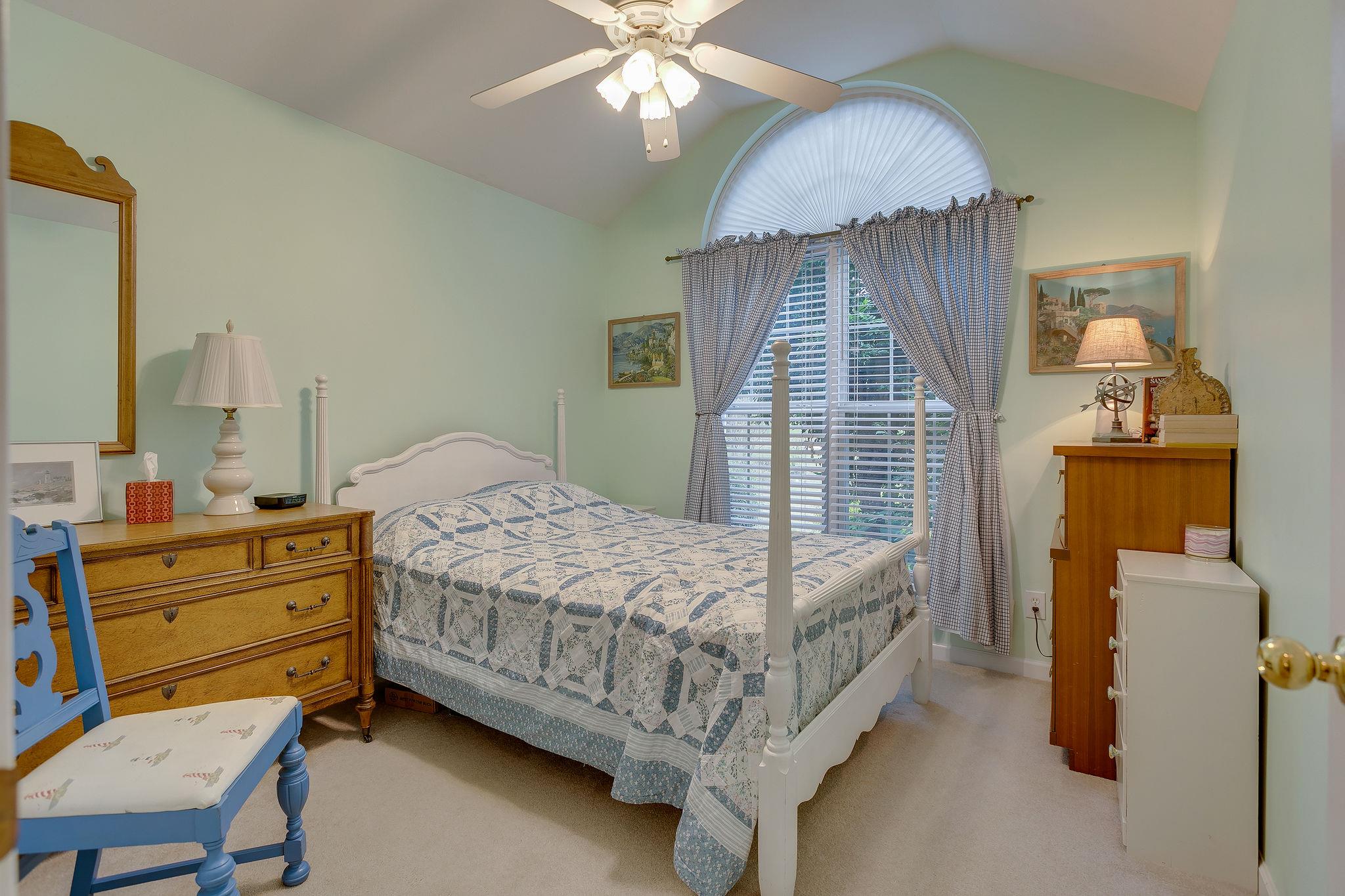 1900 Victorian Road Columbia, TN 38401 - Photo 13 of 24 a bedroom with a bed and a chandelier