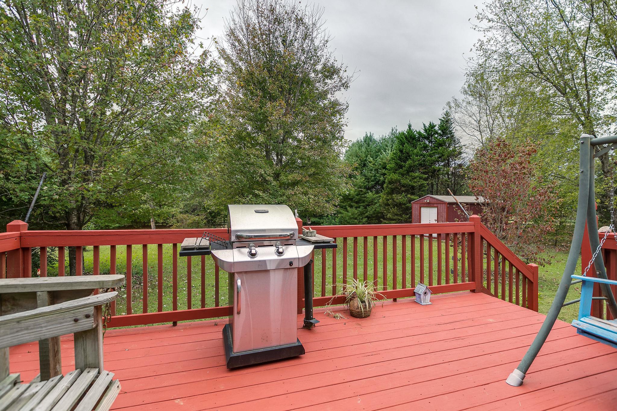1900 Victorian Road Columbia, TN 38401 - Photo 18 of 24 a view of a deck with chairs and wooden floor