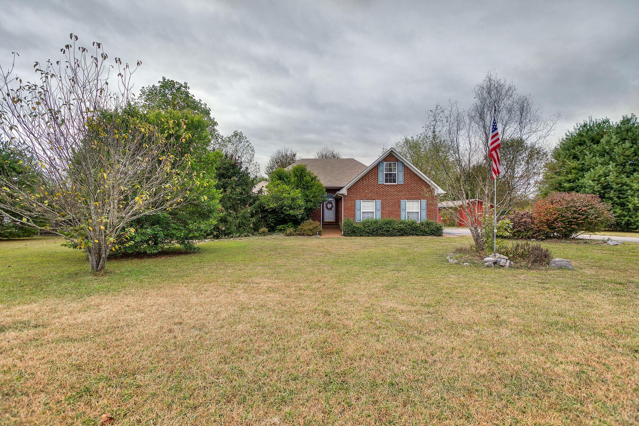 1900 Victorian Road Columbia, TN 38401 - Photo 2 of 24 a house with garden in front of it
