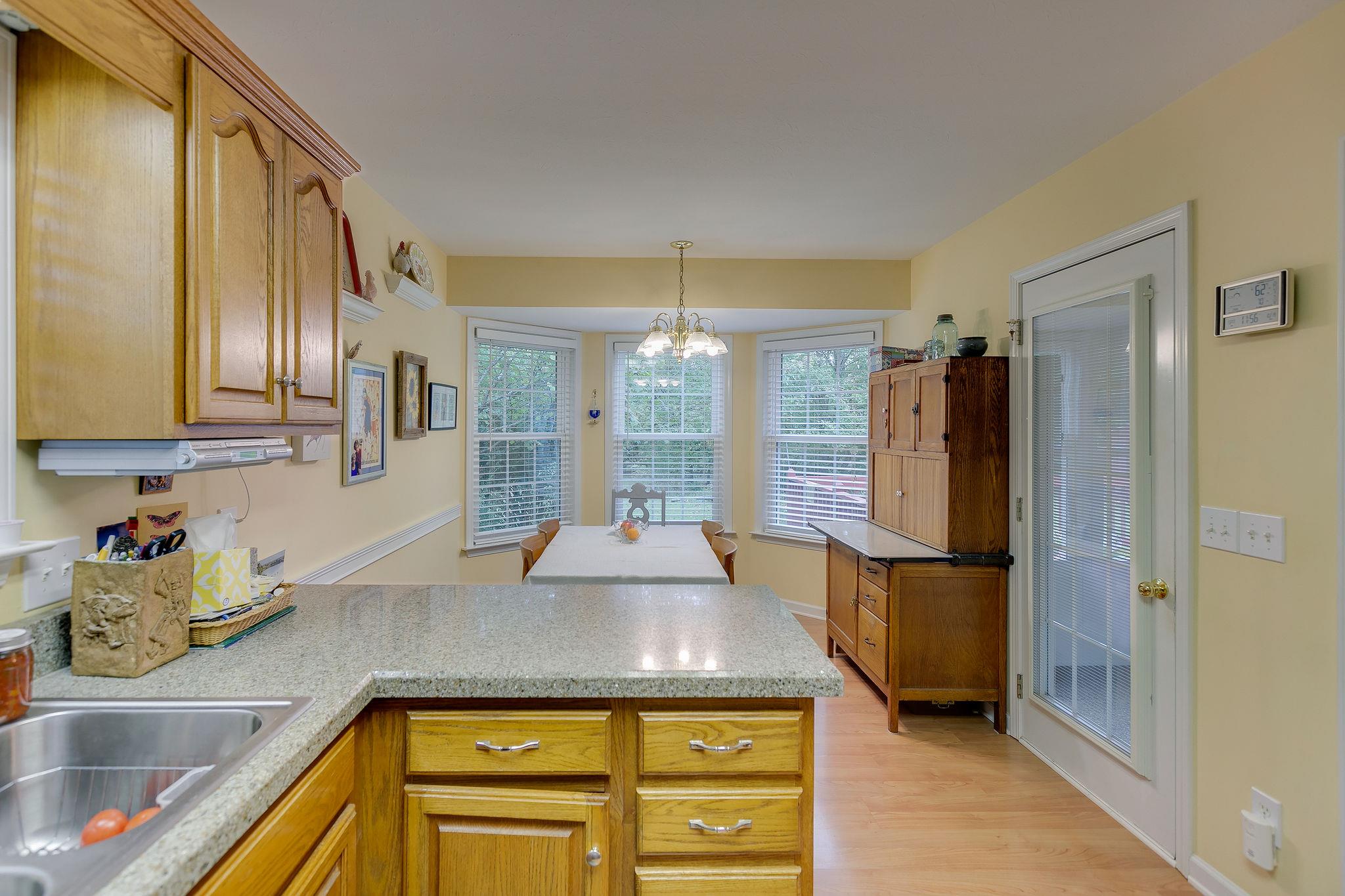 1900 Victorian Road Columbia, TN 38401 - Photo 9 of 24 a kitchen with a sink and refrigerator
