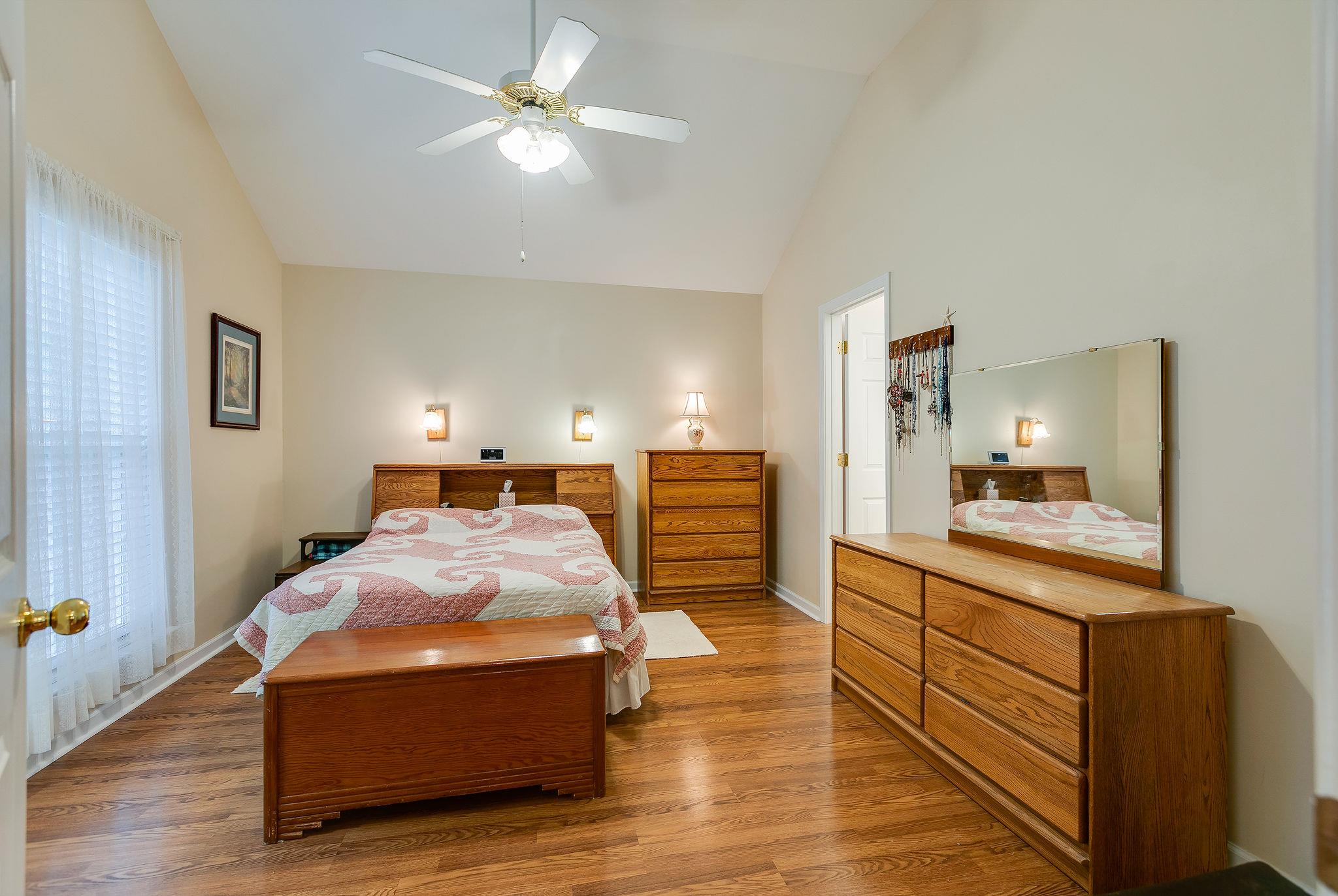 1900 Victorian Road Columbia, TN 38401 - Photo 10 of 24 a room with a bed and a view of kitchen