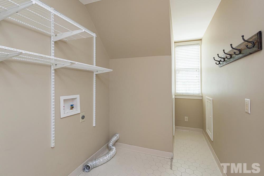 313 Jellison Court Raleigh, NC 27615 - Photo 17 of 30 Utility Room off Bonus Room with Washer/Dryer hookups.