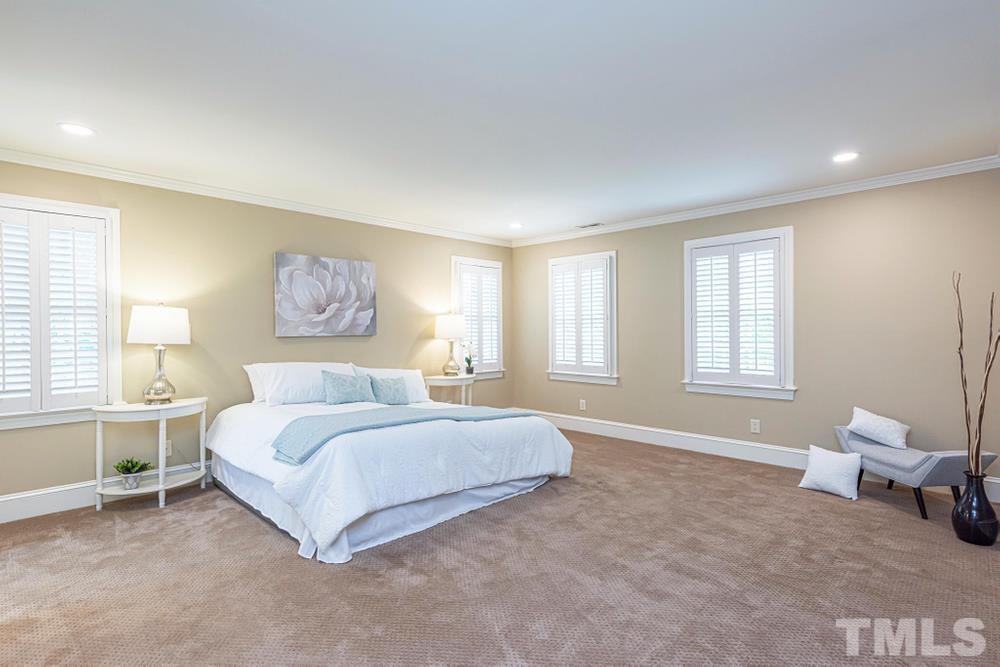 313 Jellison Court Raleigh, NC 27615 - Photo 18 of 30 Large Primary Bedroom on upper level with double windows