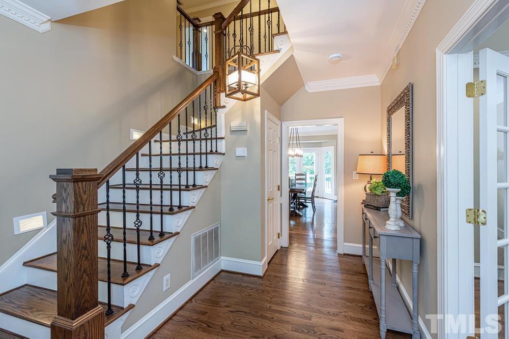313 Jellison Court Raleigh, NC 27615 - Photo 3 of 30 Entry foyer, hardwood floors through out main level.