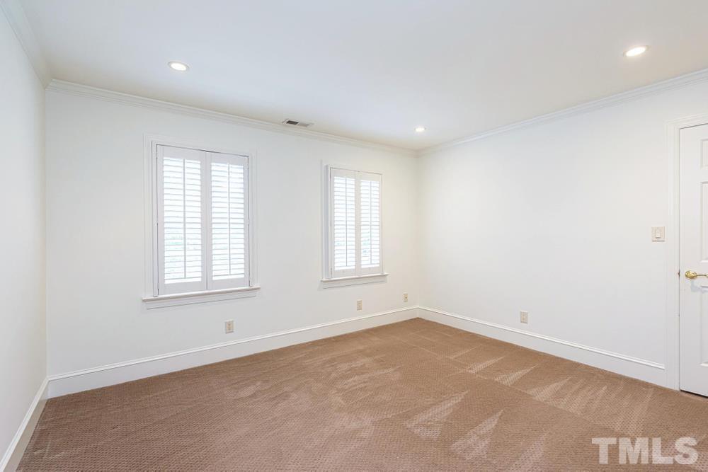 313 Jellison Court Raleigh, NC 27615 - Photo 22 of 30 Bedroom 2 with double windows and WIC.