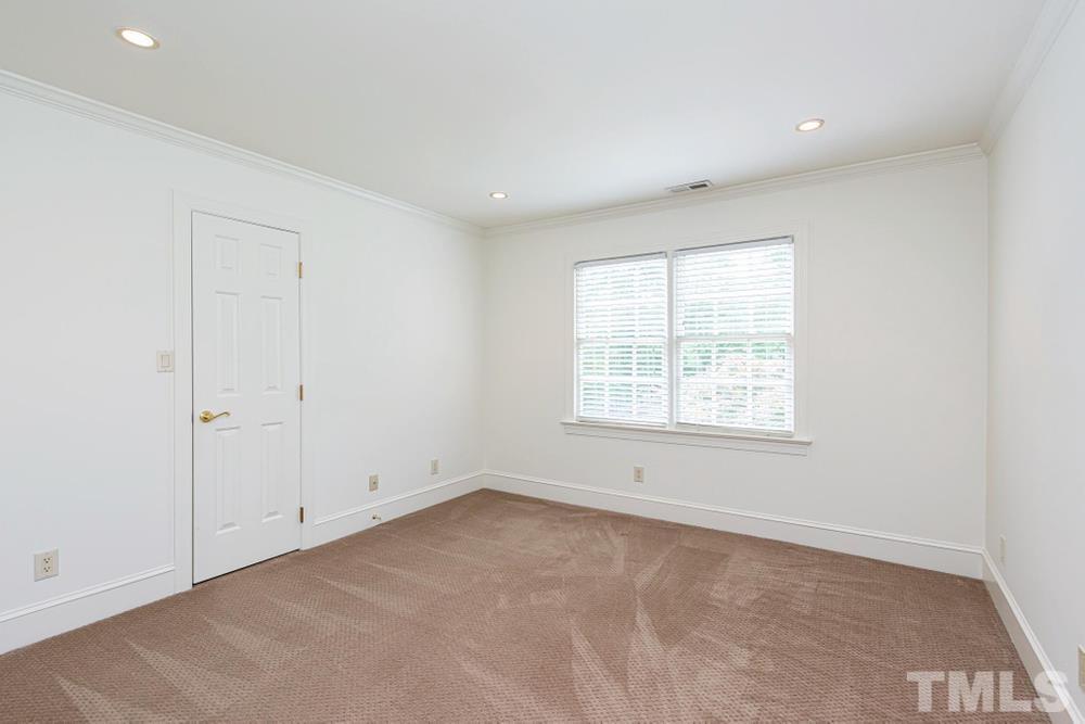 313 Jellison Court Raleigh, NC 27615 - Photo 23 of 30 Bedroom 3 with double window and WIC.