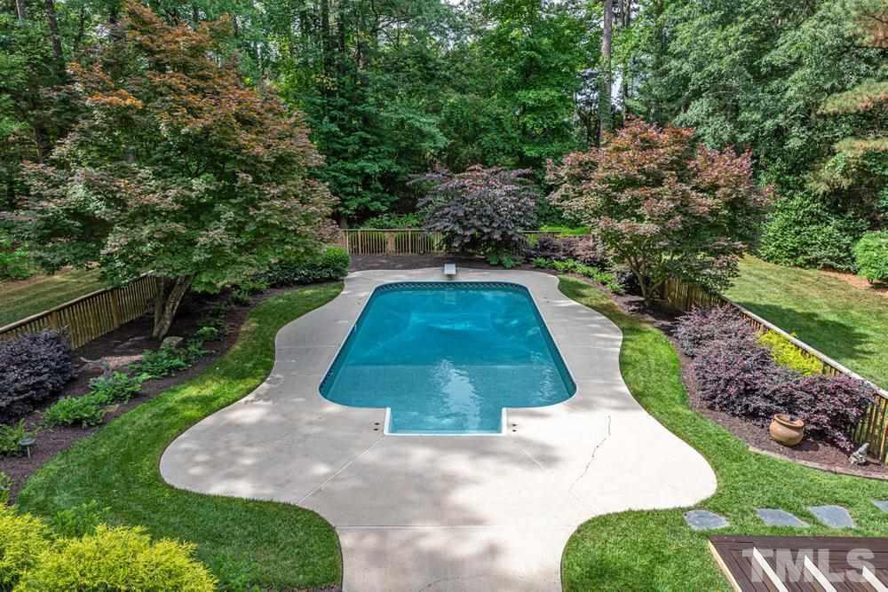 313 Jellison Court Raleigh, NC 27615 - Photo 26 of 30 Large in ground swimming pool in backyard.