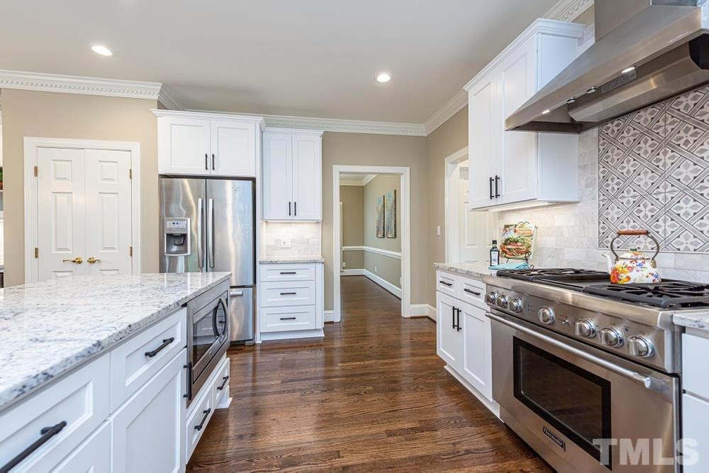 313 Jellison Court Raleigh, NC 27615 - Photo 6 of 30 Stainless Steel appliances including Thermador Range.