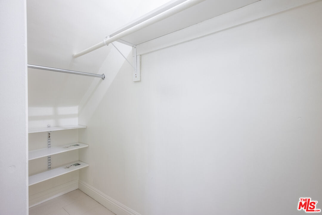 148 South Reeves Drive, Unit 4 Beverly Hills, CA 90212 - Photo 15 of 15 a view of an empty walk in closet
