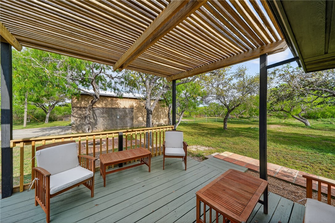291 Boenig Road Woodsboro, TX 78393 - Photo 24 of 39 Sitting area under your pergola
