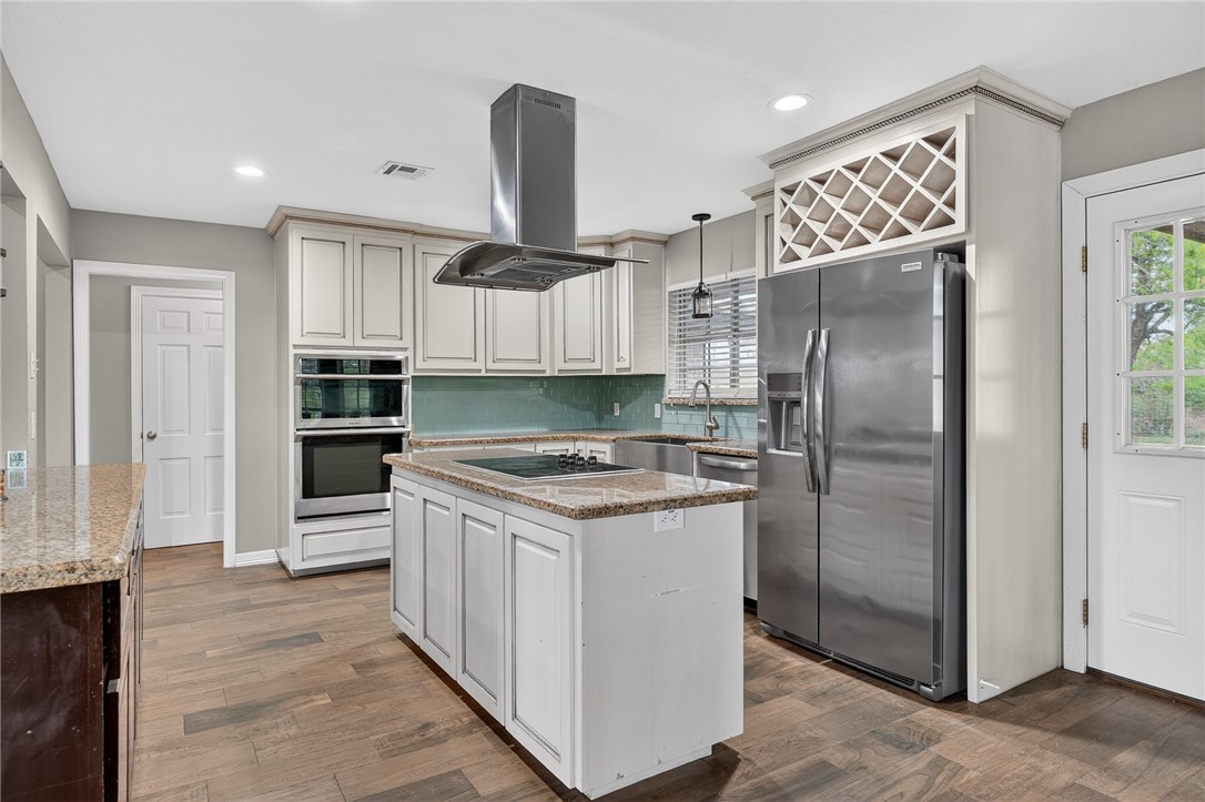 291 Boenig Road Woodsboro, TX 78393 - Photo 8 of 39 Lovely kitchen will please any chef and wine drink