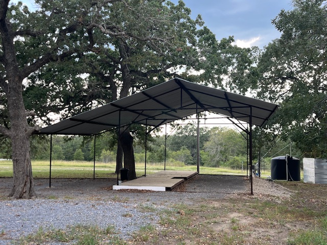 266 Catfish Lane, Unit A OR #B Lockhart, TX 78644 - Photo 8 of 8 a backyard of a house with barbeque oven