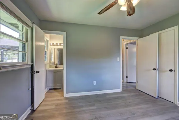a bathroom with a glass shower door