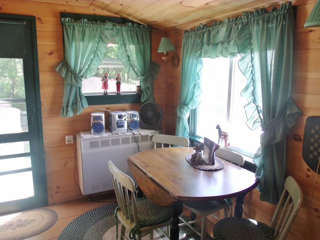 36 Cottage Road Wilton, ME 04294 - Photo 4 of 22 Main Camp Dining Area