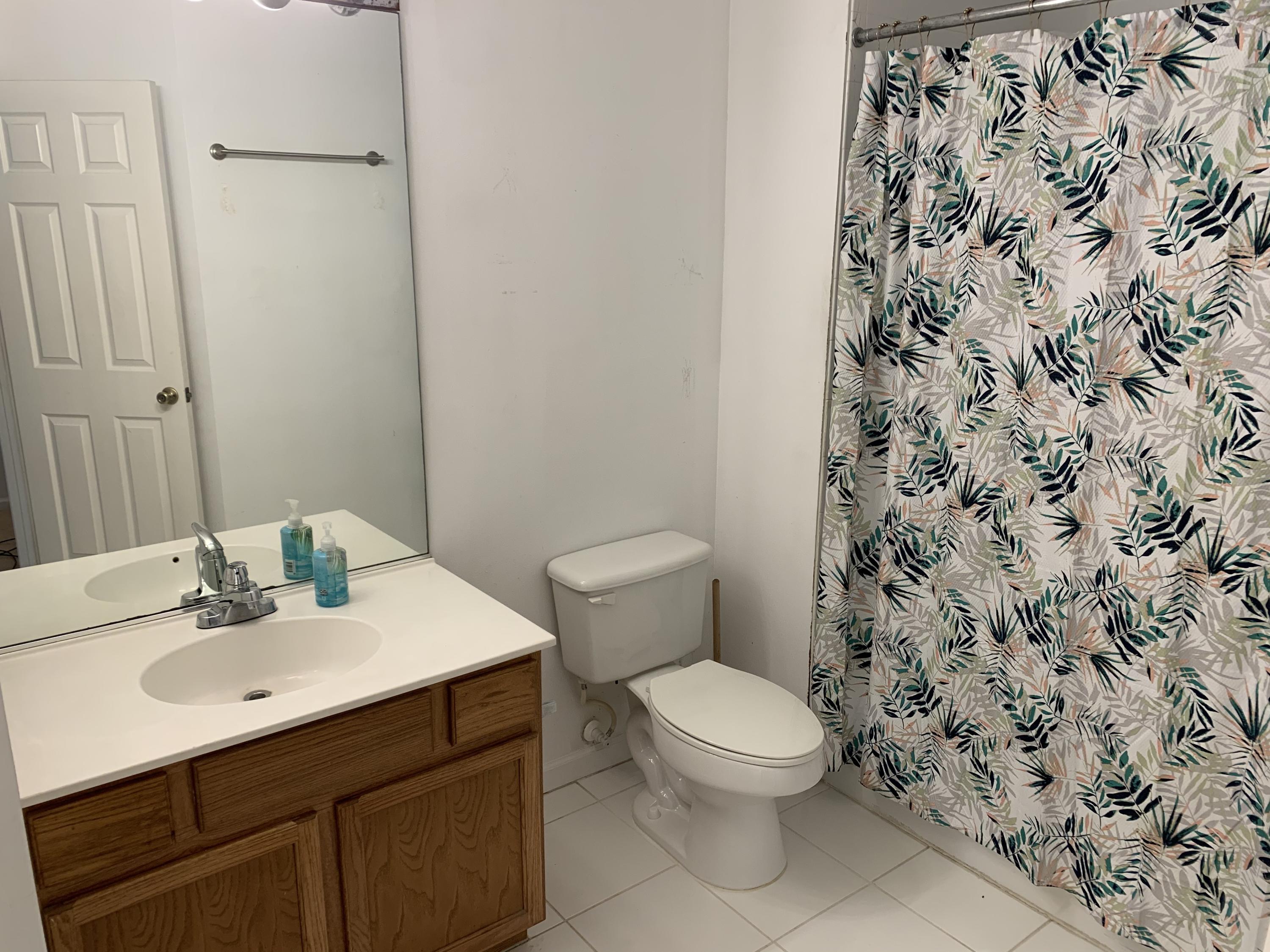 1055 Woodfield Road Greenacres, FL 33415 - Photo 12 of 20 Full bath
