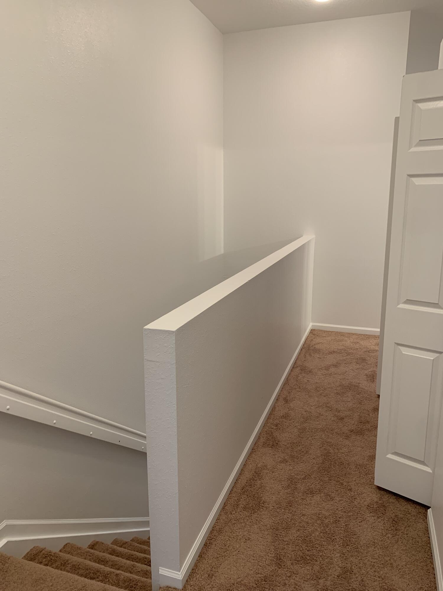 1055 Woodfield Road Greenacres, FL 33415 - Photo 14 of 20 Upstairs hall w/new carpet