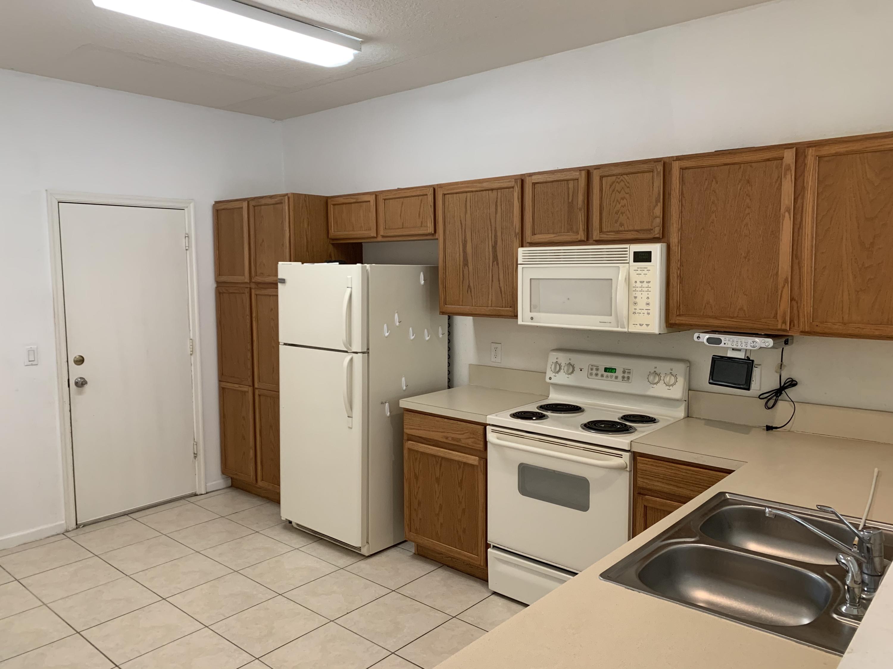 1055 Woodfield Road Greenacres, FL 33415 - Photo 5 of 20 Kitchen