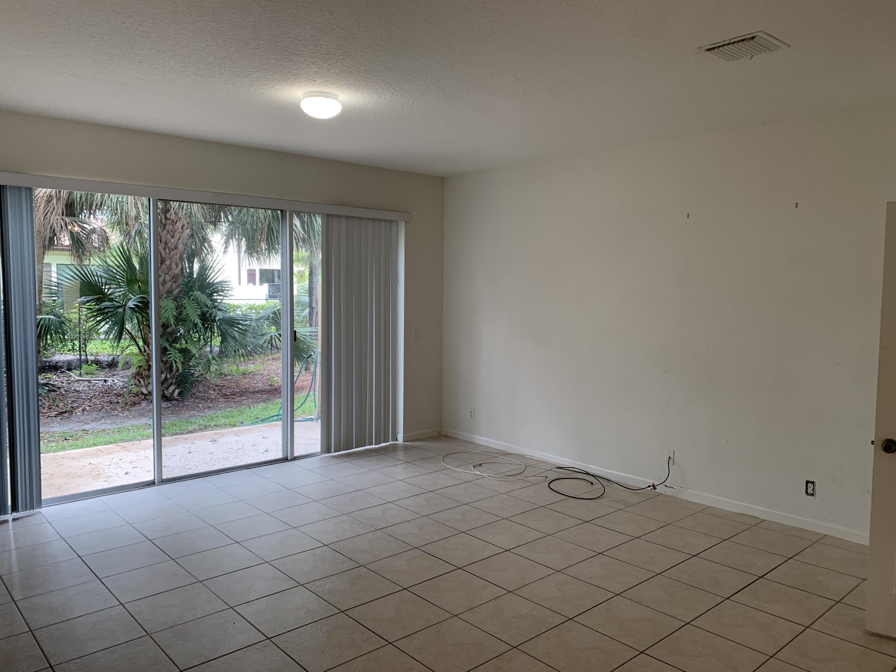 1055 Woodfield Road Greenacres, FL 33415 - Photo 6 of 20 Family room