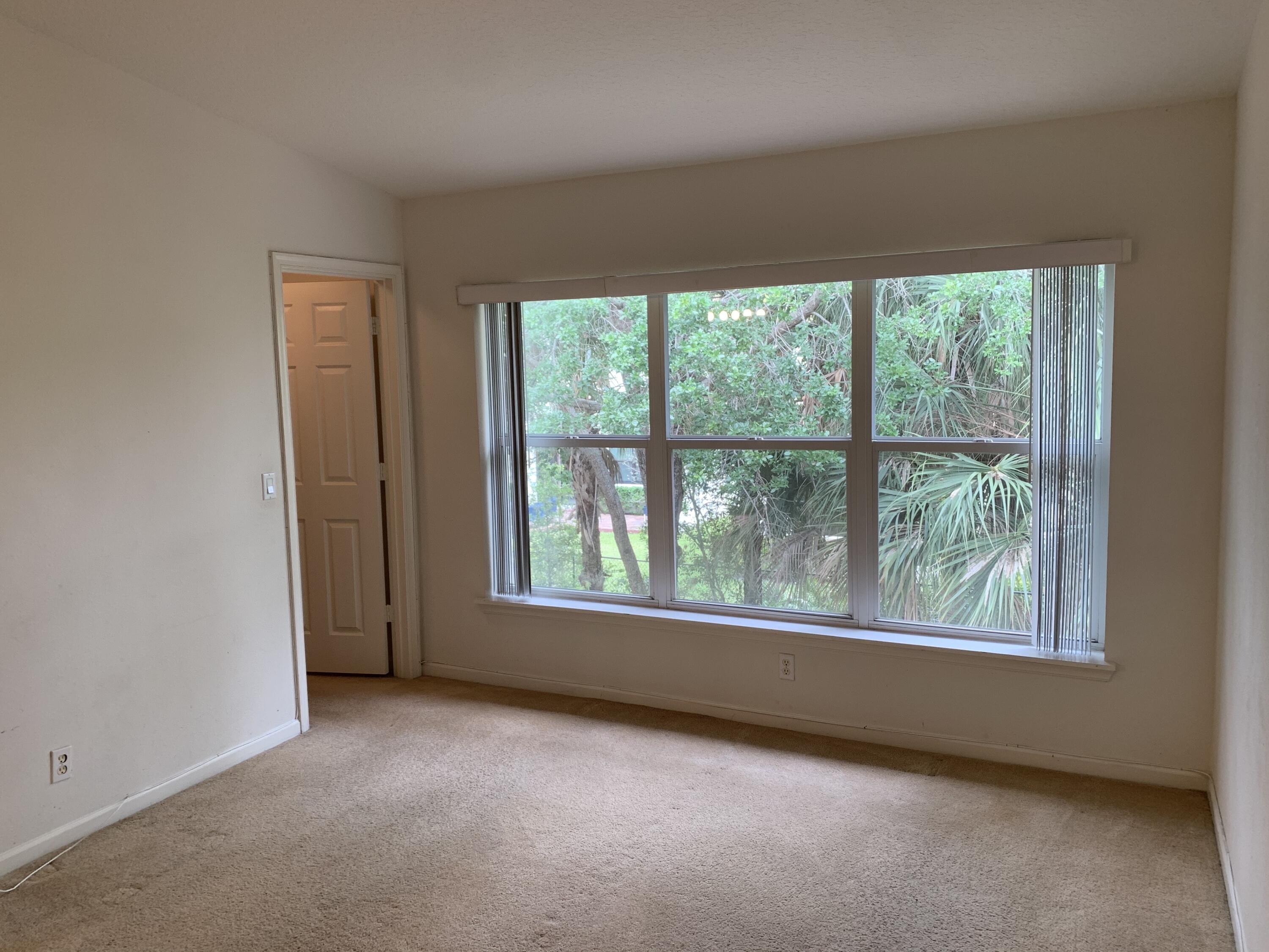 1055 Woodfield Road Greenacres, FL 33415 - Photo 9 of 20 Master Bedroom