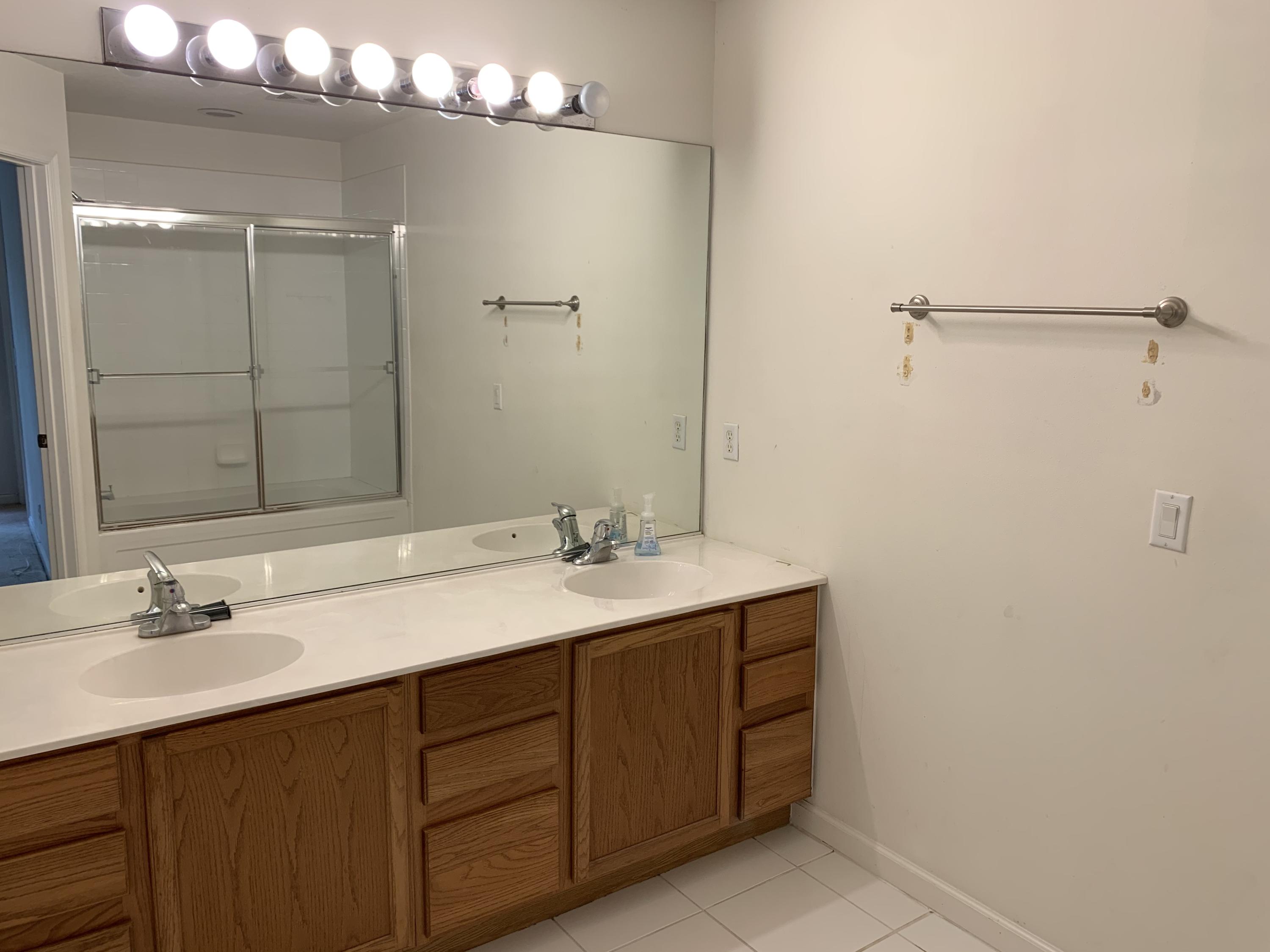 1055 Woodfield Road Greenacres, FL 33415 - Photo 10 of 20 Master bathroom