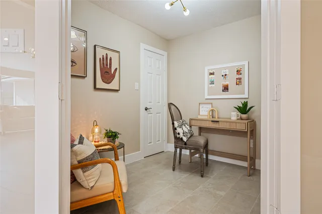 a workspace with furniture and desk