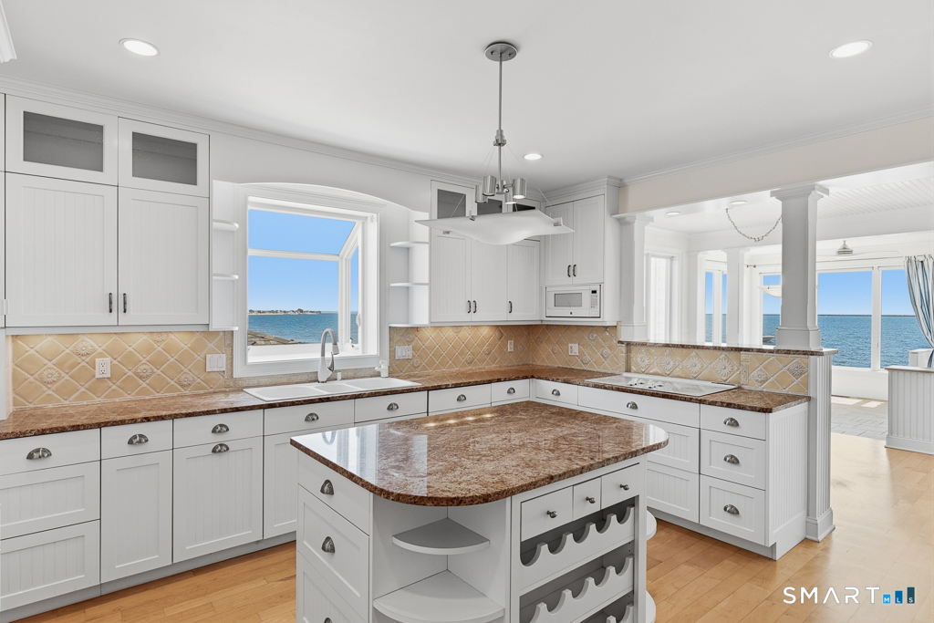 167 Shore Road Clinton, CT 06413 - Photo 9 of 40 Custom cabinetry, granite countertops and views abound