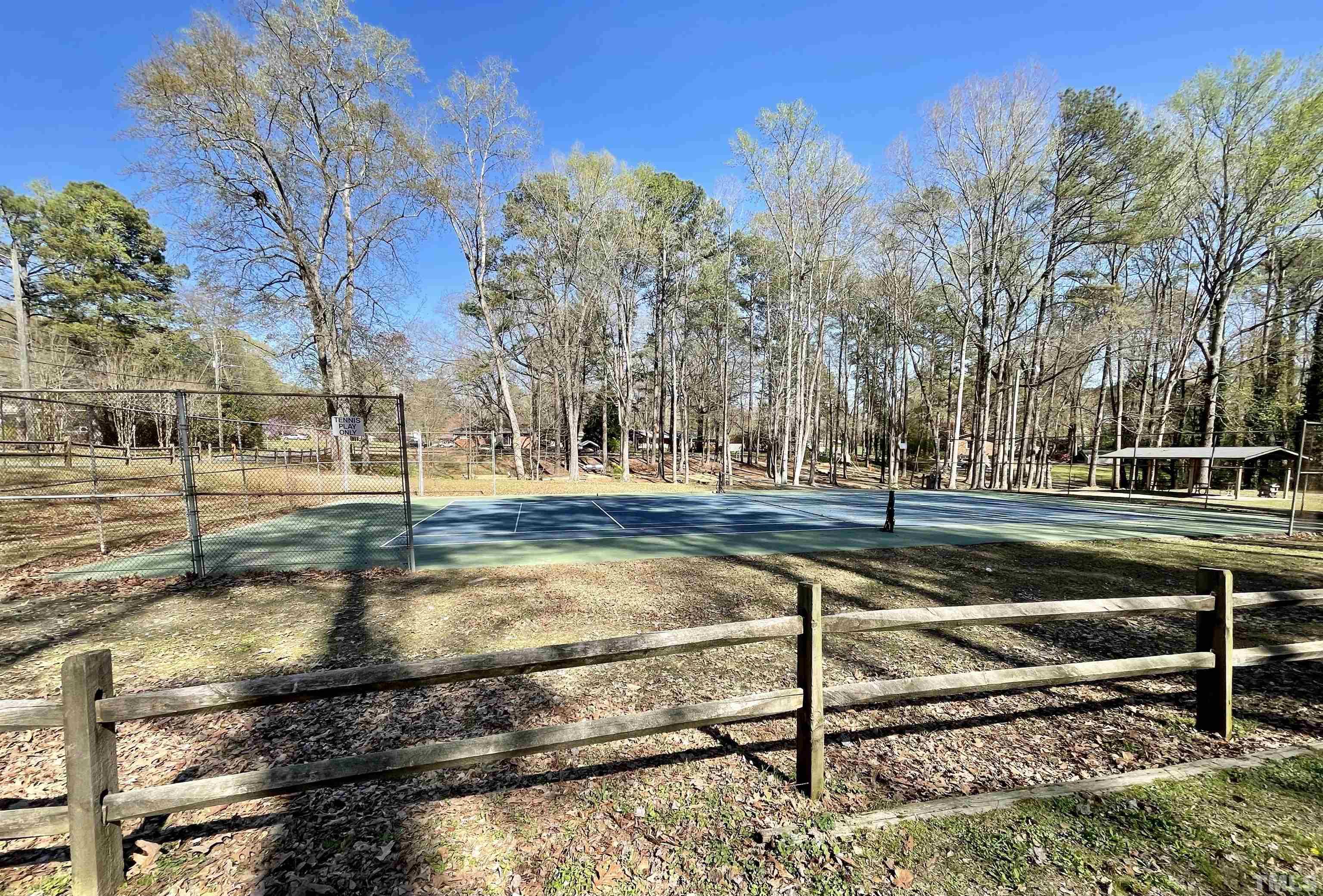 626 Winterlochen Road Raleigh, NC 27603 - Photo 16 of 16 a view of a park with large trees