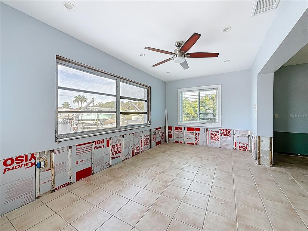 4869 Shell Stream Boulevard New Port Richey, FL 34652 - Photo 19 of 46 a view of a room with window and furniture