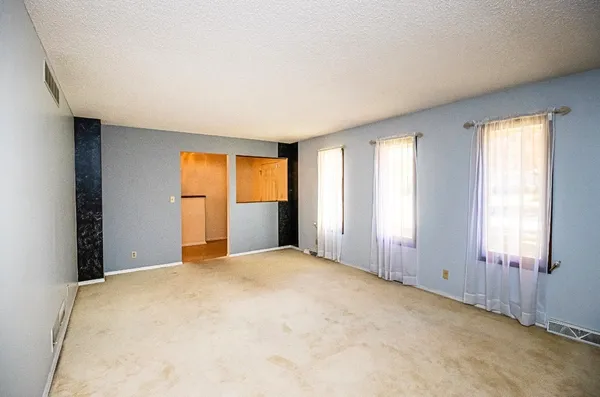 a view of a hallway with entryway